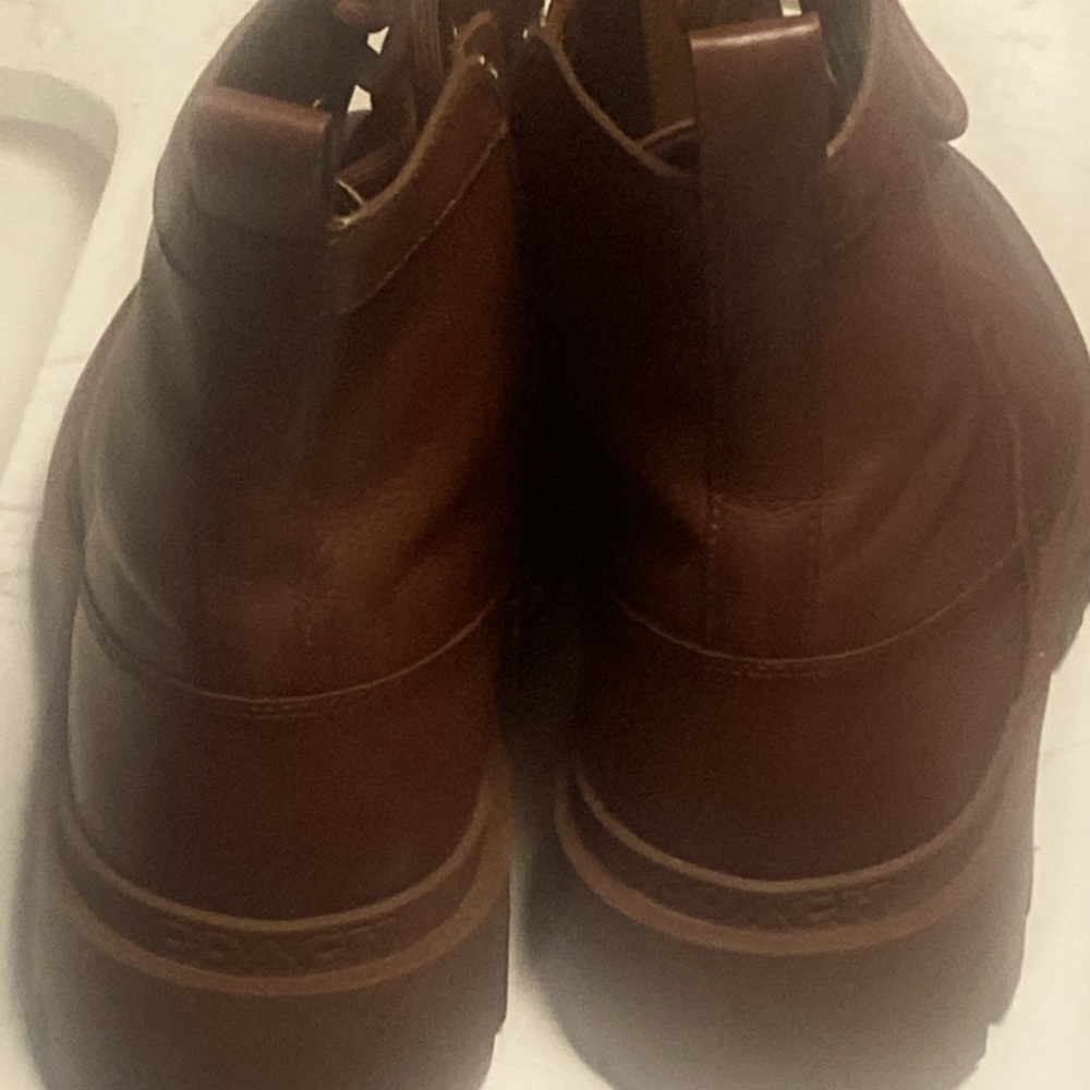 Brown coach boots I wore once they run big there very very comfortable boots